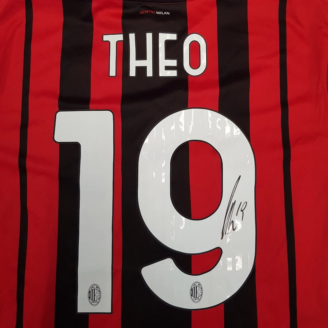 Theo Hernandez Milan store shirt - Signed